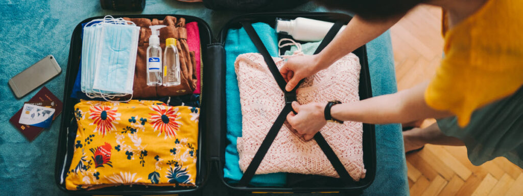 tips for traveling light - packed suitcase