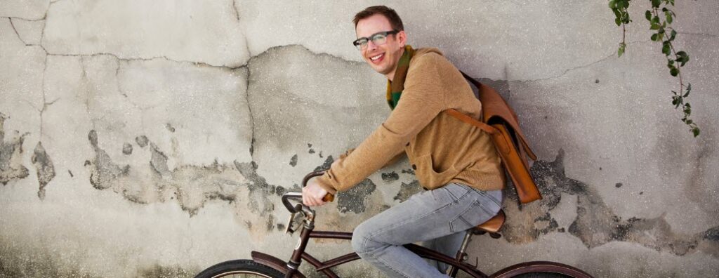 Travel Messenger Bags - cyclist with messenger bag