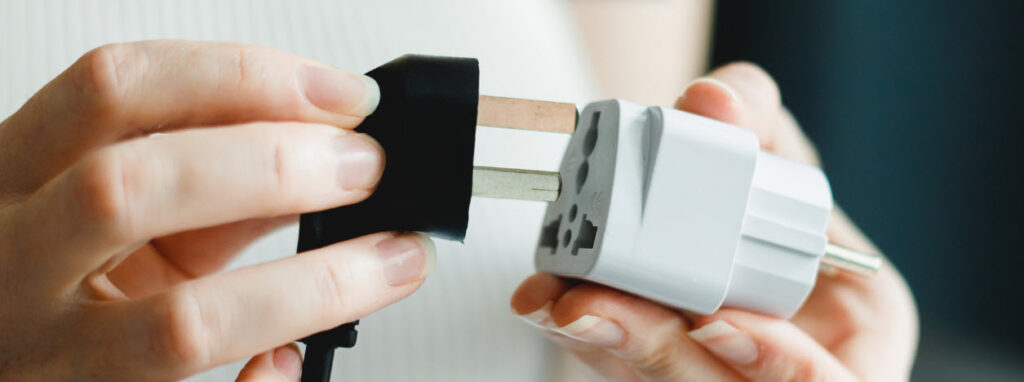 best Power Adapters for International Travel - adapter plugging in